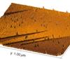 Nano-hillocks: Of mountains and craters