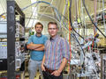 Electrons in quantum liquid gain energy from laser pulses